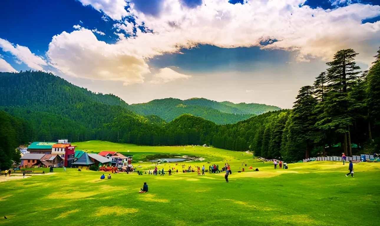 Scenic view of Mini Switzerland with lush green meadows, pine forests, rolling hills, and breathtaking Himalayan mountain landscapes.