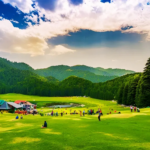 Scenic view of Mini Switzerland with lush green meadows, pine forests, rolling hills, and breathtaking Himalayan mountain landscapes.