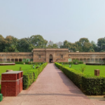 Travel-themed image showcasing the historic and spiritual attractions of Sarnath, including ancient Buddhist monuments and peaceful surroundings.