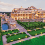 Luxury resort near Delhi with grand palace-style architecture, beautiful gardens, glowing lights, and romantic ambiance for couples.