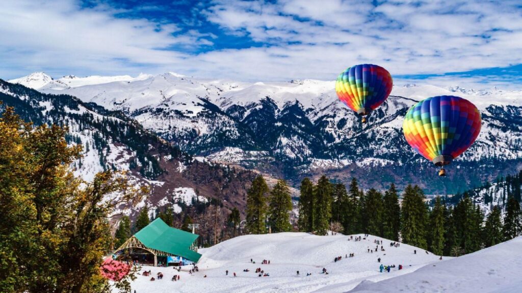 Snow-covered mountains in Manali with scenic valleys, pine forests, adventure activities, and breathtaking Himalayan landscapes.