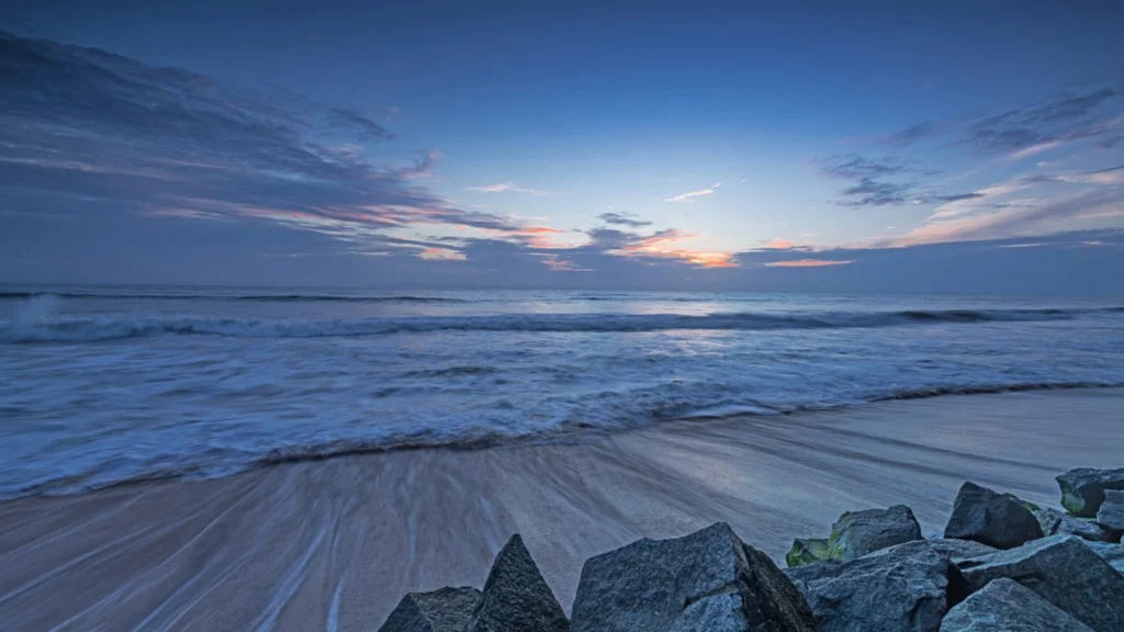 Cherai Beach with golden sand and coconut trees near Kochi, Kerala